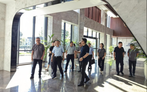 携手共进，智造未来——金华职业技术大学校长梁克东一行到访杭机股份